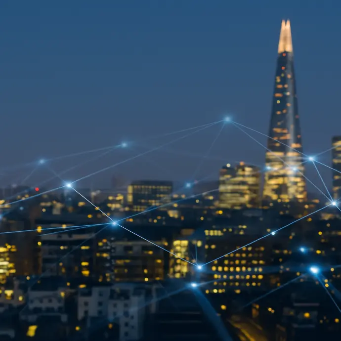 A blurred London cityscape with digital lines overlayed